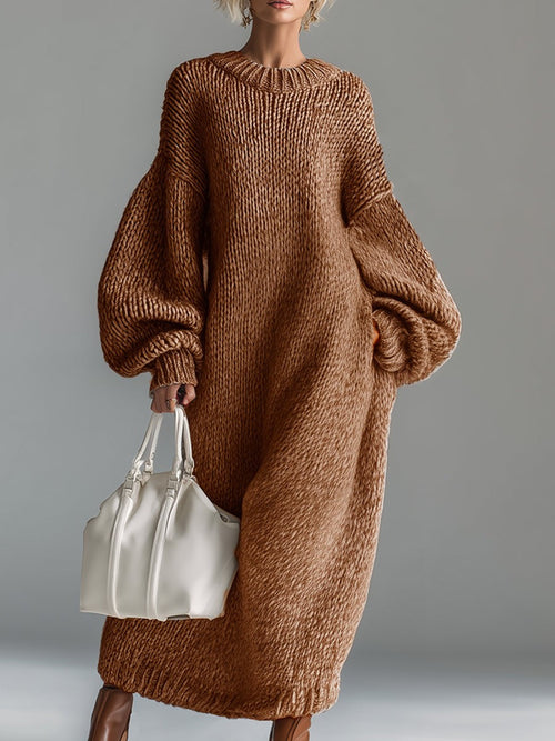 Woman wearing an oversized chunky knit maxi jumper dress with balloon sleeves and ribbed crew neck - view 2