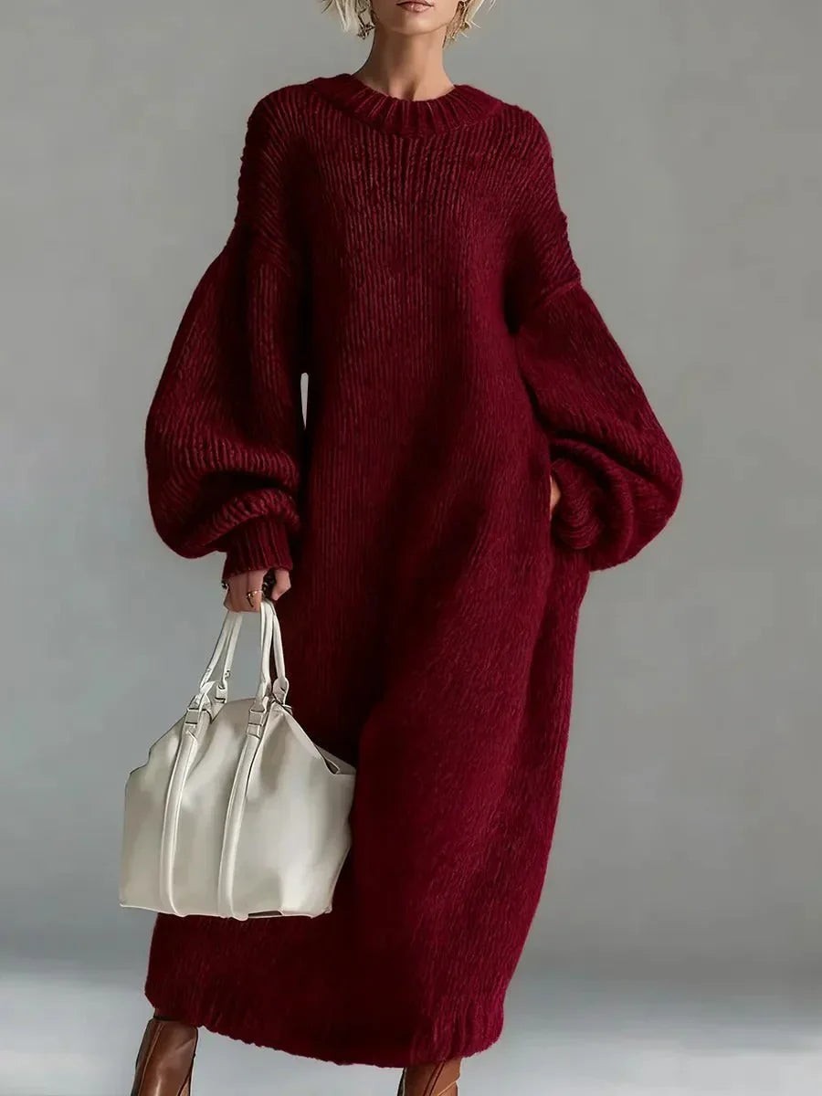 Woman wearing an oversized chunky knit maxi jumper dress with balloon sleeves and ribbed crew neck - view 3
