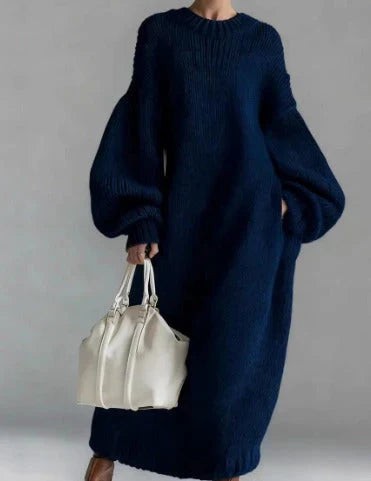 Woman wearing an oversized chunky knit maxi jumper dress with balloon sleeves and ribbed crew neck - view 4
