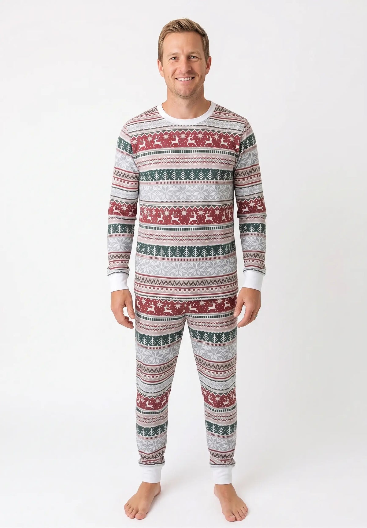Family wearing matching Fair Isle Christmas pyjamas with reindeer and snowflake print - view 10