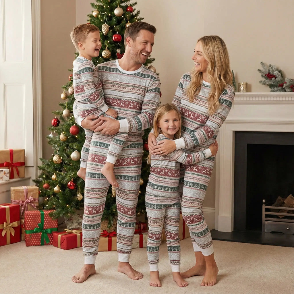 Family wearing matching Fair Isle Christmas pyjamas with reindeer and snowflake print - view 3