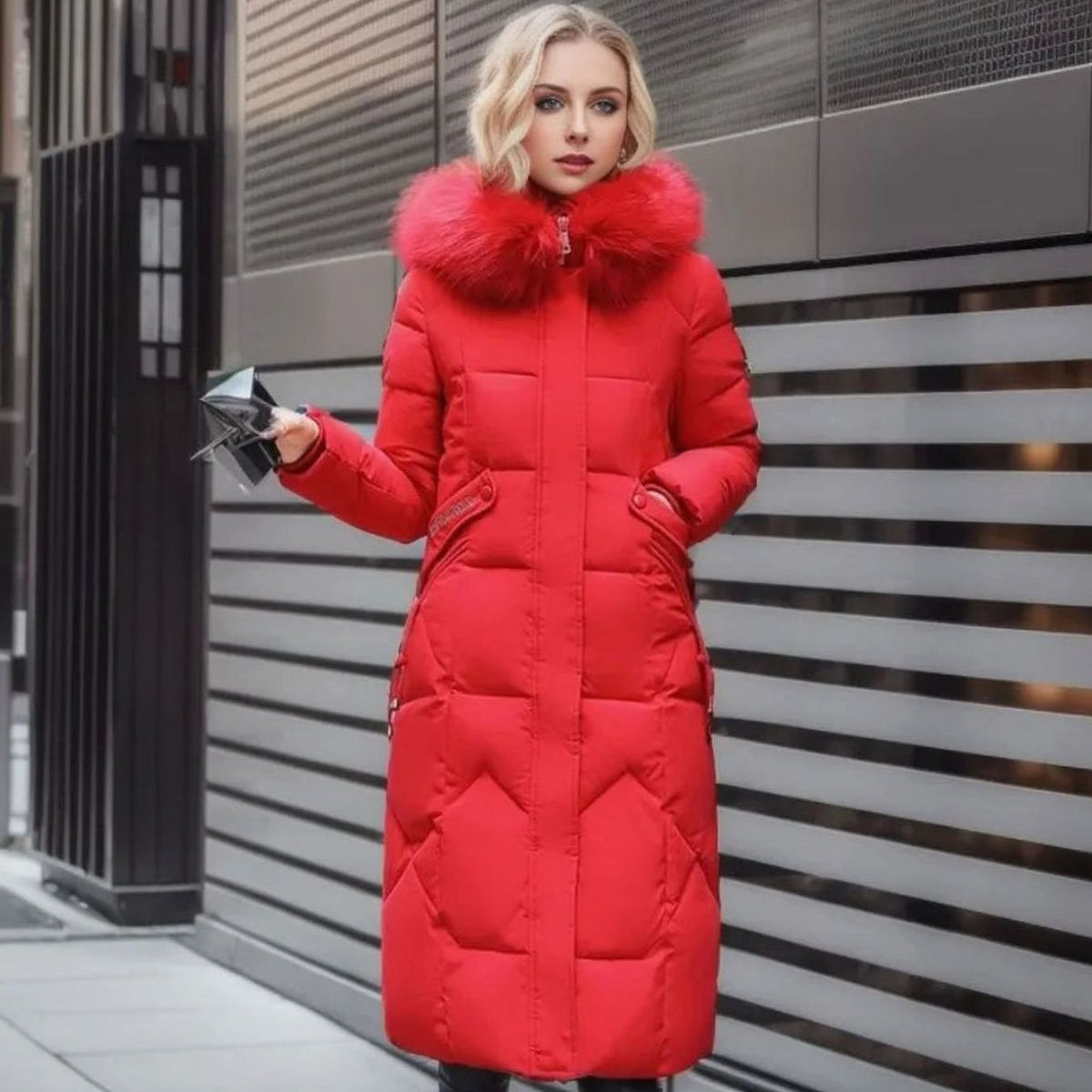 Woman wearing a long cream quilted winter coat with faux fur trimmed hood - view 13
