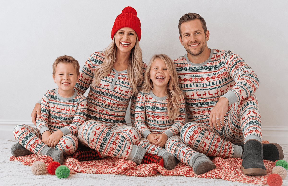Matching family Christmas pyjamas with cream, red and green reindeer Fair Isle print and grey ribbed cuffs - view 6
