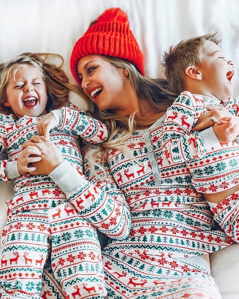 Matching family Christmas pyjamas with cream, red and green reindeer Fair Isle print and grey ribbed cuffs - view 7