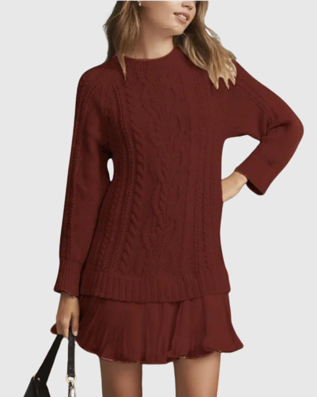 Woman wearing a cable knit jumper dress with a crew neck, long sleeves and pleated mini hem - view 6