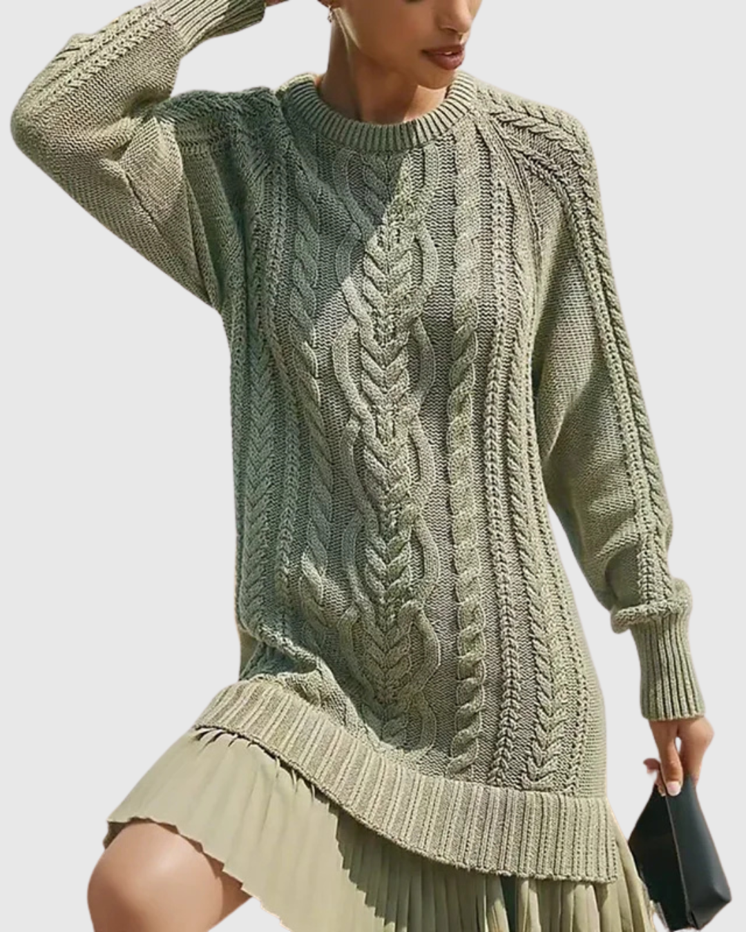 Woman wearing a cable knit jumper dress with a crew neck, long sleeves and pleated mini hem - view 7