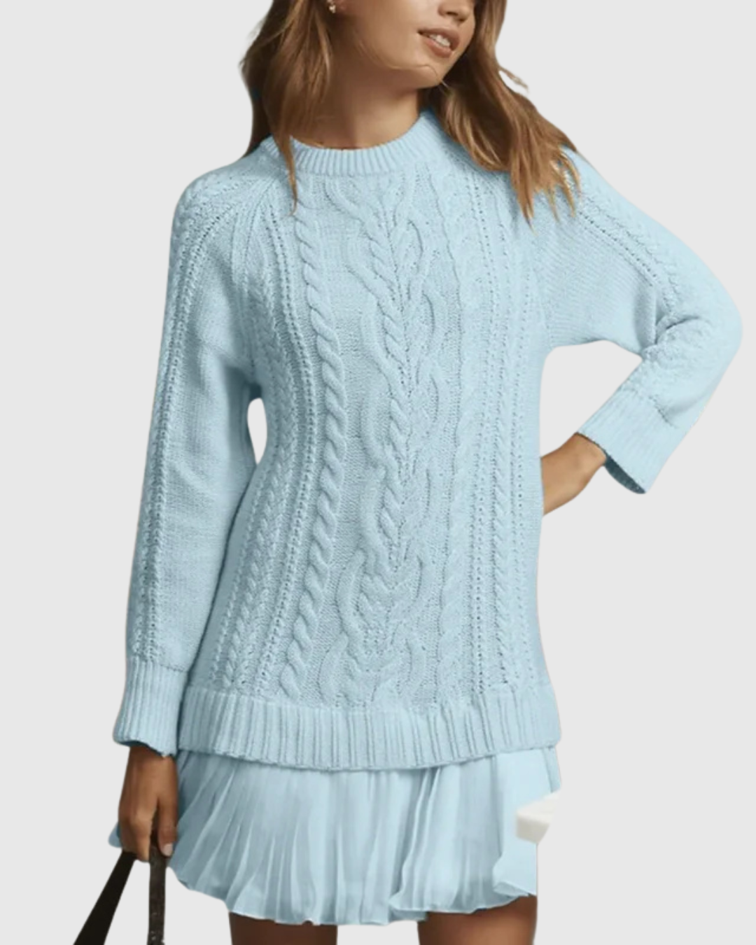 Woman wearing a cable knit jumper dress with a crew neck, long sleeves and pleated mini hem - view 9