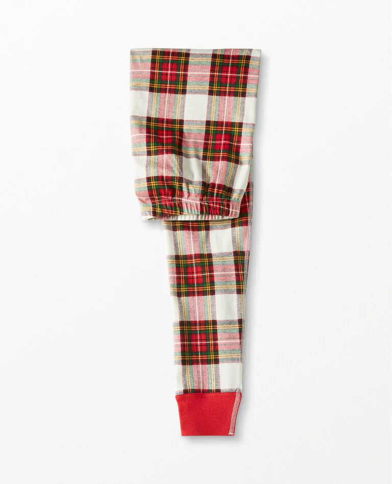 Family wearing matching red and cream tartan Christmas pyjamas with red ribbed cuffs - view 13