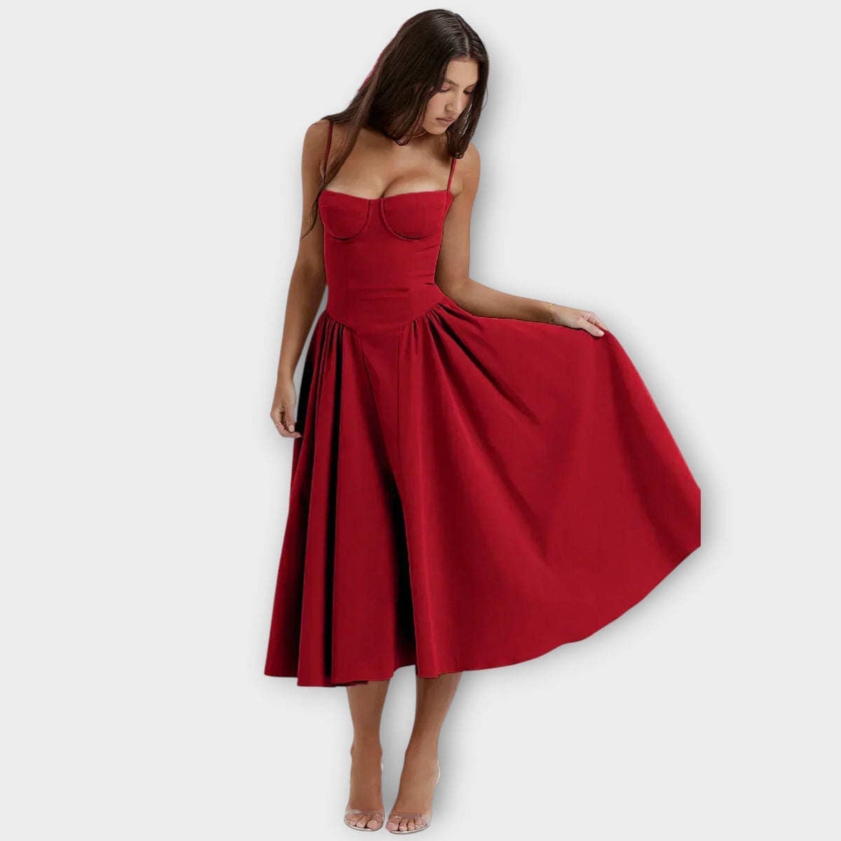 Woman wearing a sleeveless sweetheart corset midi dress with spaghetti straps and a full gathered skirt - view 12