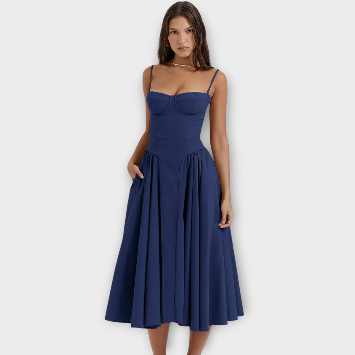 Woman wearing a sleeveless sweetheart corset midi dress with spaghetti straps and a full gathered skirt - view 3