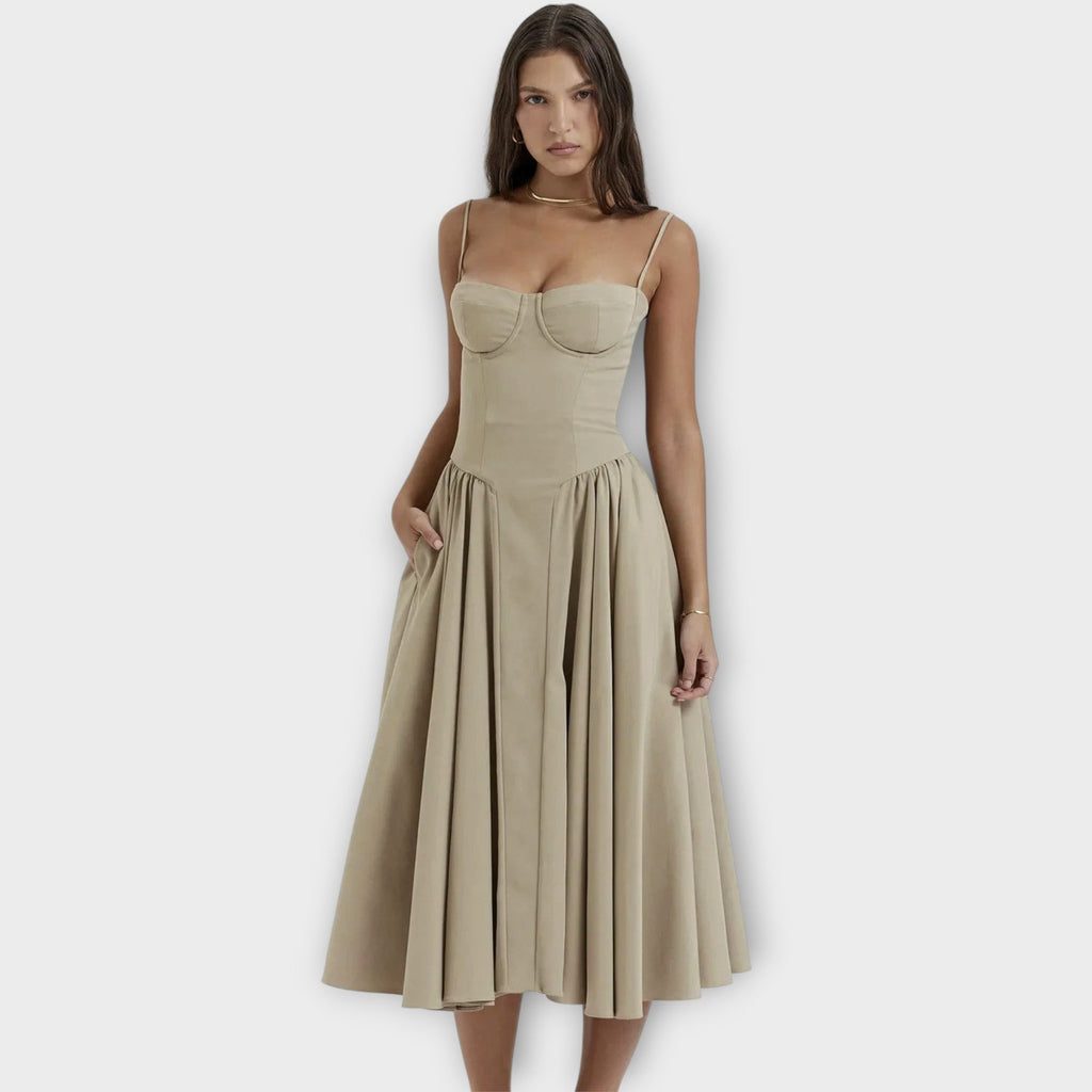 Woman wearing a sleeveless sweetheart corset midi dress with spaghetti straps and a full gathered skirt - view 5