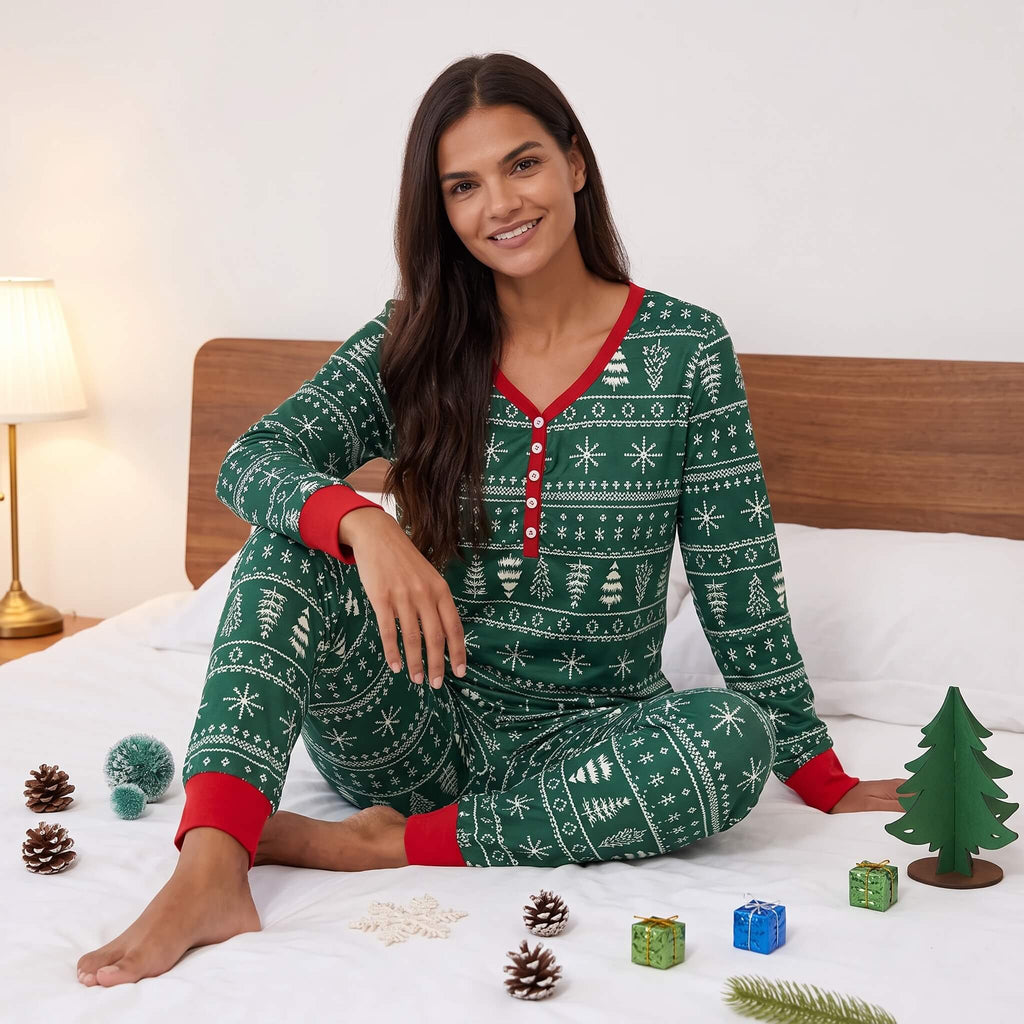 Family in matching green Fair Isle Christmas tree print pyjamas with red cuffs - view 12