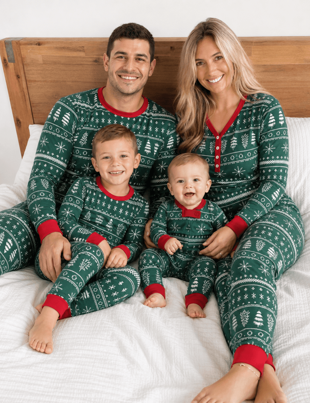 Family in matching green Fair Isle Christmas tree print pyjamas with red cuffs - view 3