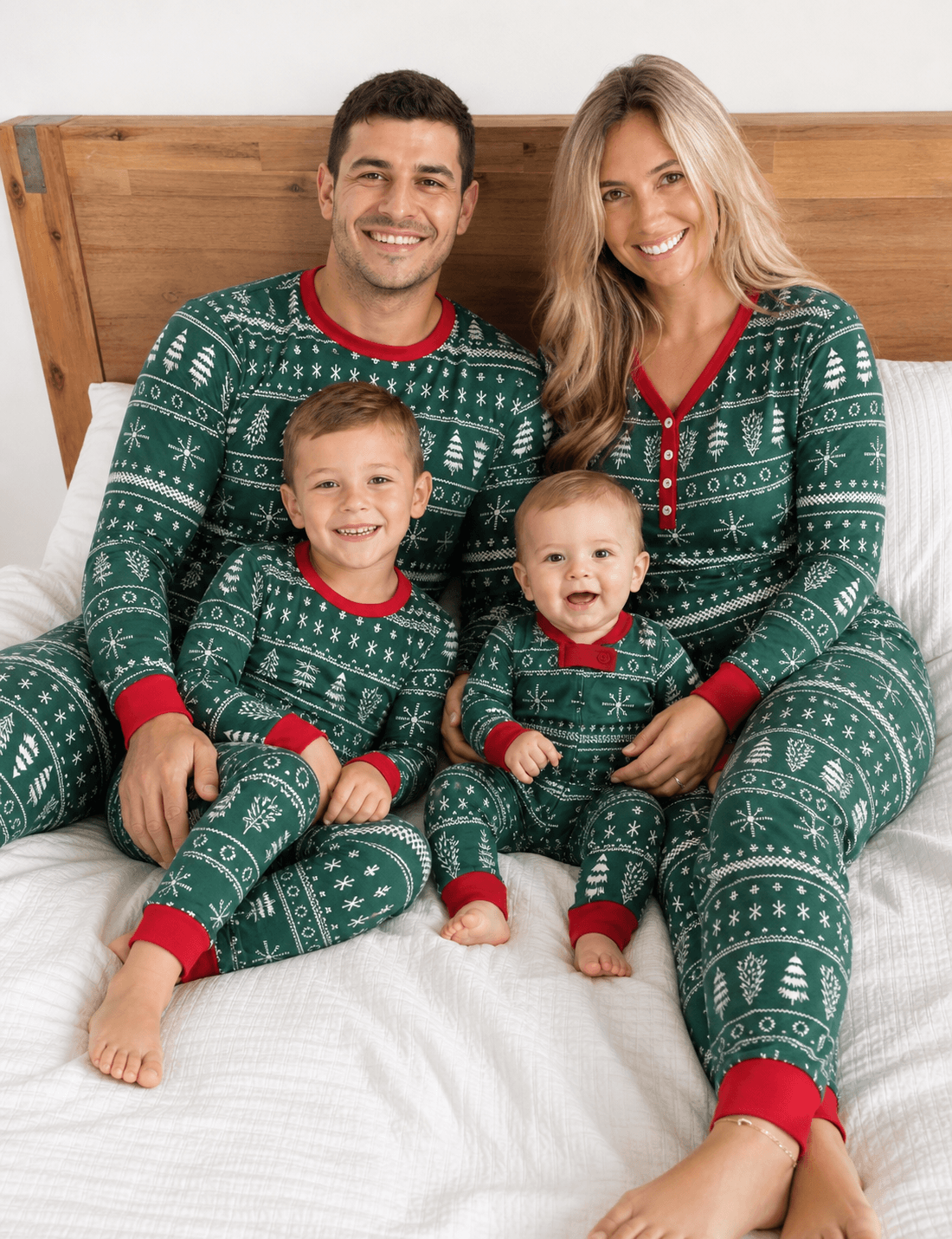 Family in matching green Fair Isle Christmas tree print pyjamas with red cuffs - view 3