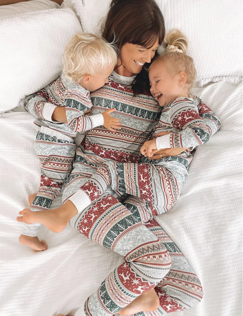 Family wearing matching Fair Isle reindeer print Christmas pyjamas - view 11