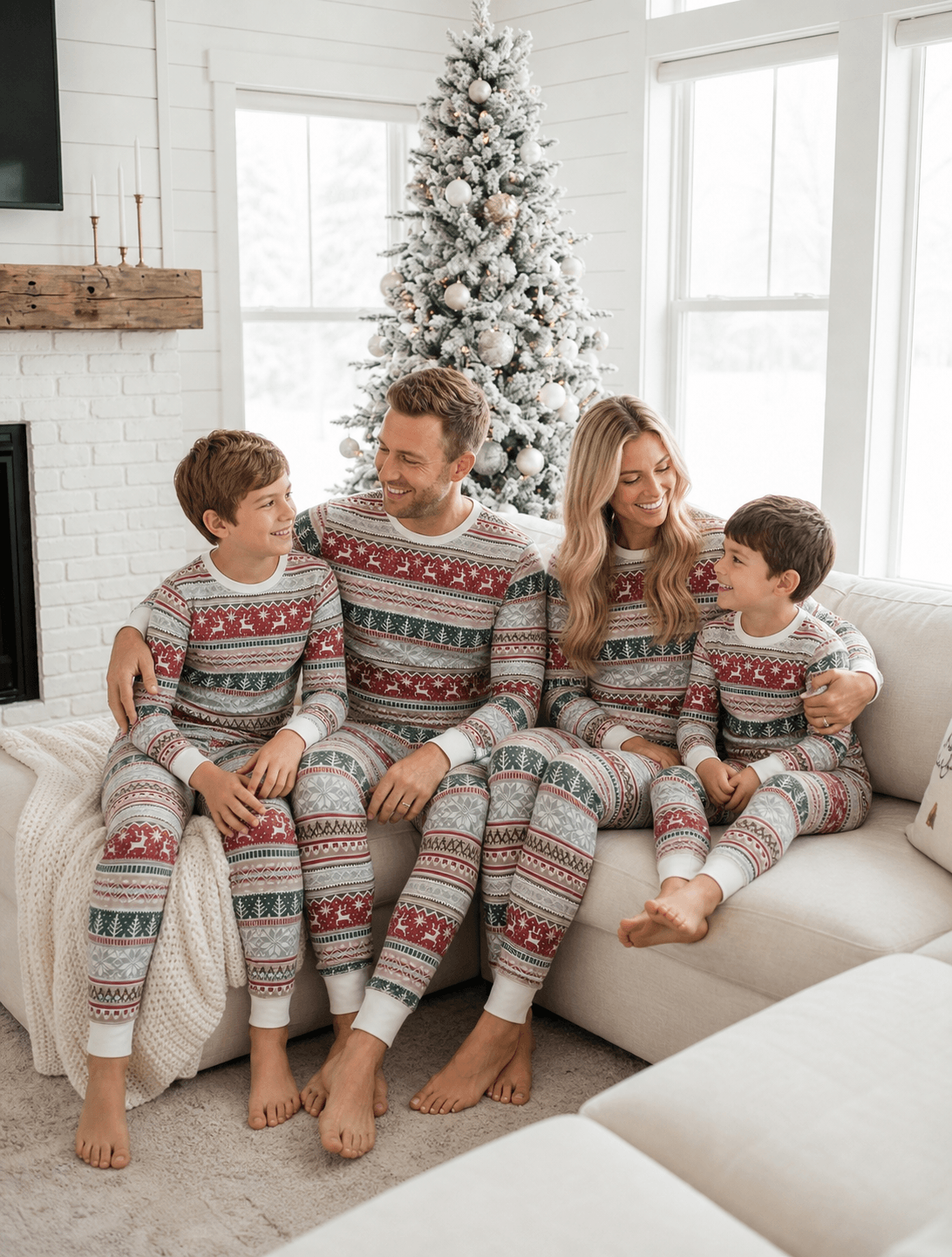 Family wearing matching Fair Isle reindeer print Christmas pyjamas - view 2