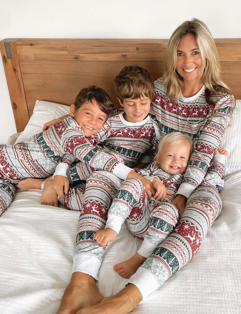 Family wearing matching Fair Isle reindeer print Christmas pyjamas - view 4