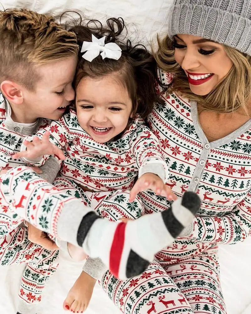 Matching family Christmas pyjamas with red and green reindeer Fair Isle print and grey cuffs - view 14