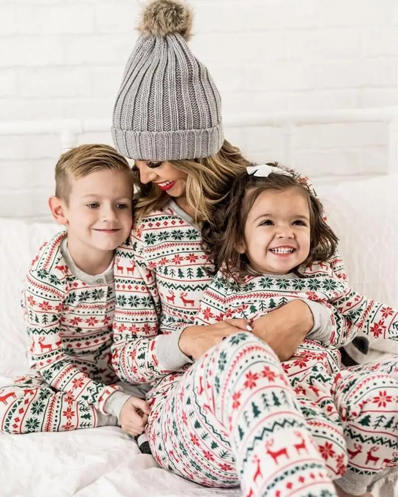 Matching family Christmas pyjamas with red and green reindeer Fair Isle print and grey cuffs - view 4