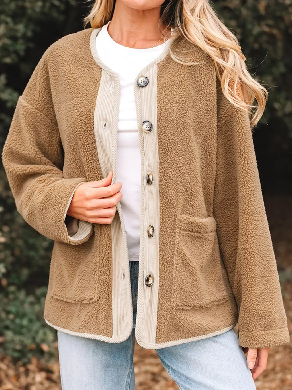 Camel collarless teddy jacket with cream cord trim, button front and patch pockets