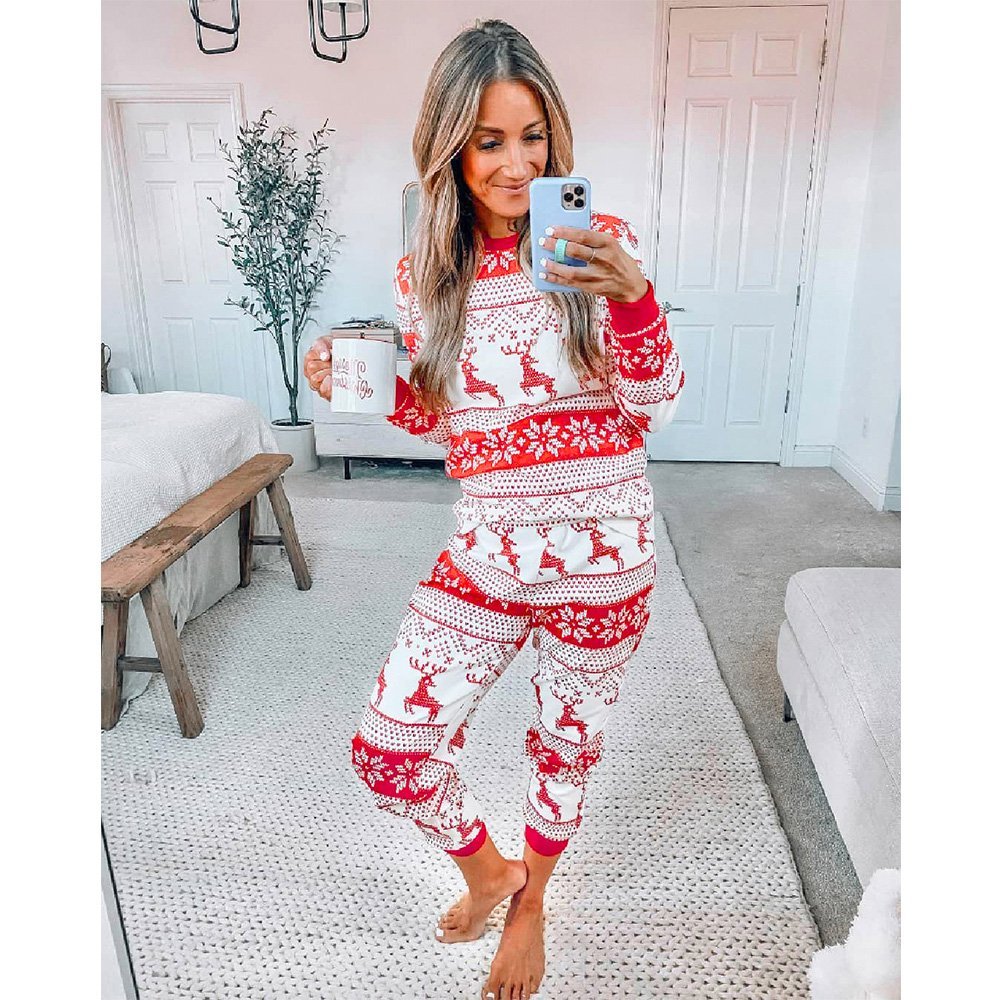 Matching family Christmas pyjamas with red reindeer and snowflake print on white - view 5