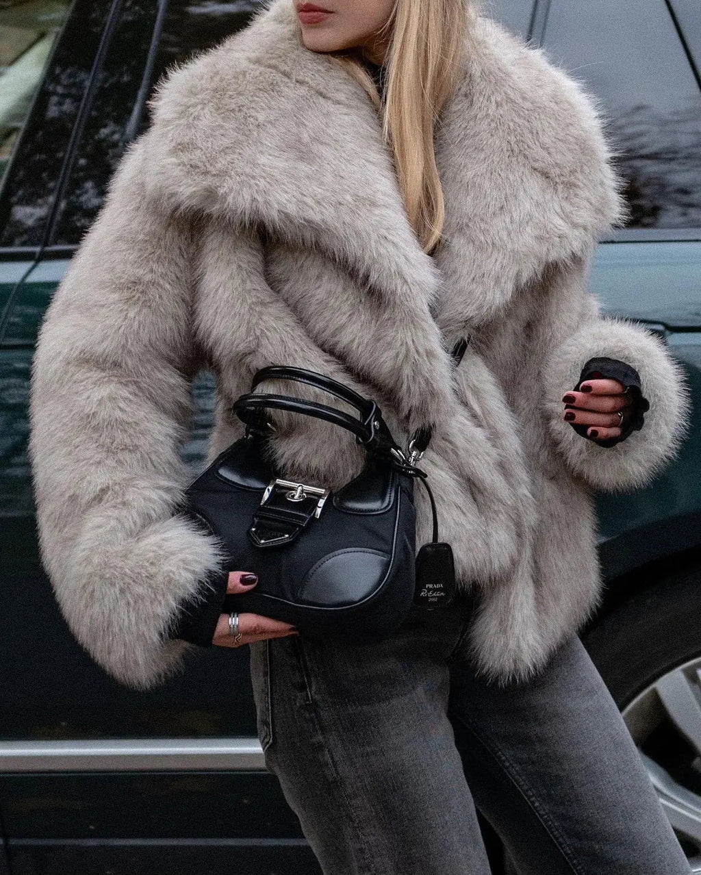 Grey faux fur jacket with oversized collar worn open over jeans - view 2