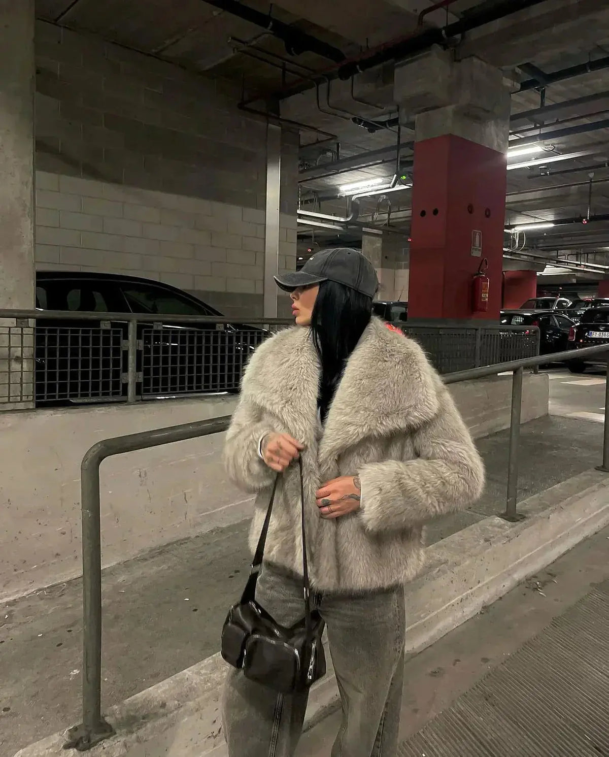 Grey faux fur jacket with oversized collar worn open over jeans - view 4