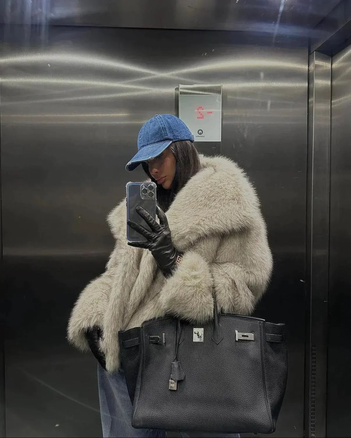 Grey faux fur jacket with oversized collar worn open over jeans - view 5