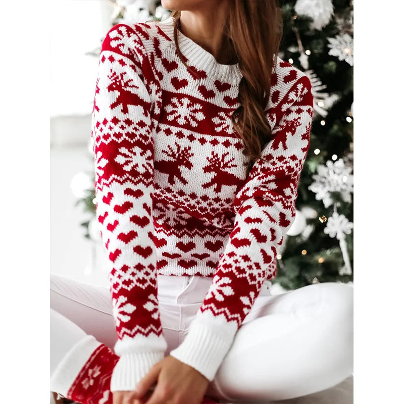 Women's red and white Fair Isle Christmas jumper with reindeer, snowflake and heart pattern