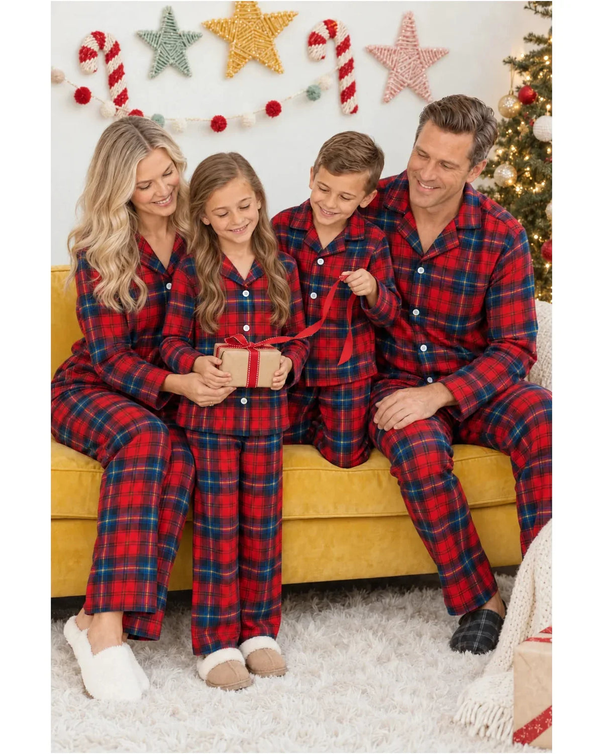 Family wearing matching red tartan flannel Christmas pyjamas with notch collar and button front - view 15