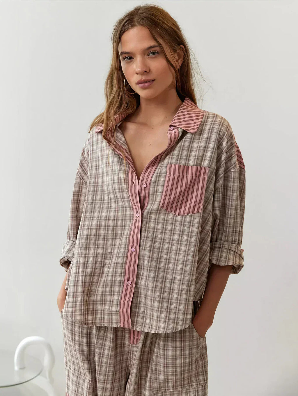 Oversized pink plaid pyjama set with contrast stripe collar, pocket and cuffs and drawstring trousers