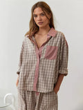 Oversized pink plaid pyjama set with contrast stripe collar, pocket and cuffs and drawstring trousers