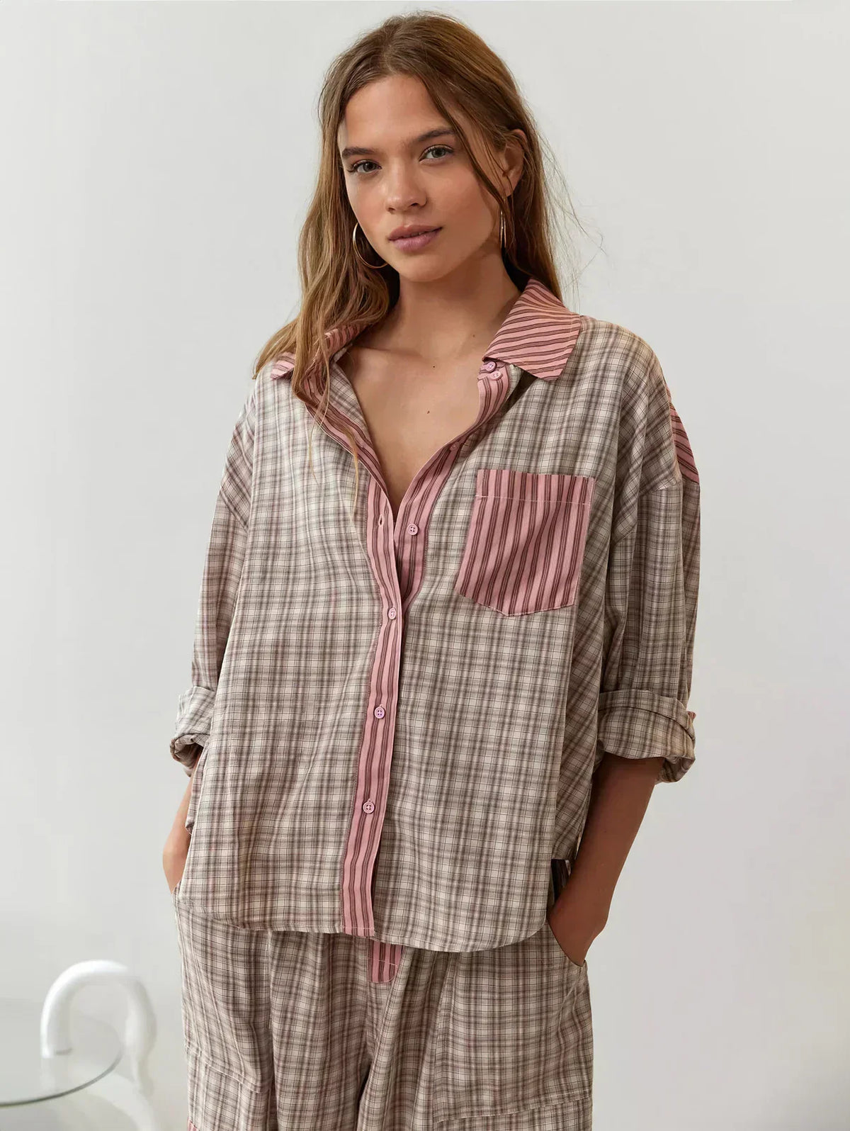 Oversized pink plaid pyjama set with contrast stripe collar, pocket and cuffs and drawstring trousers