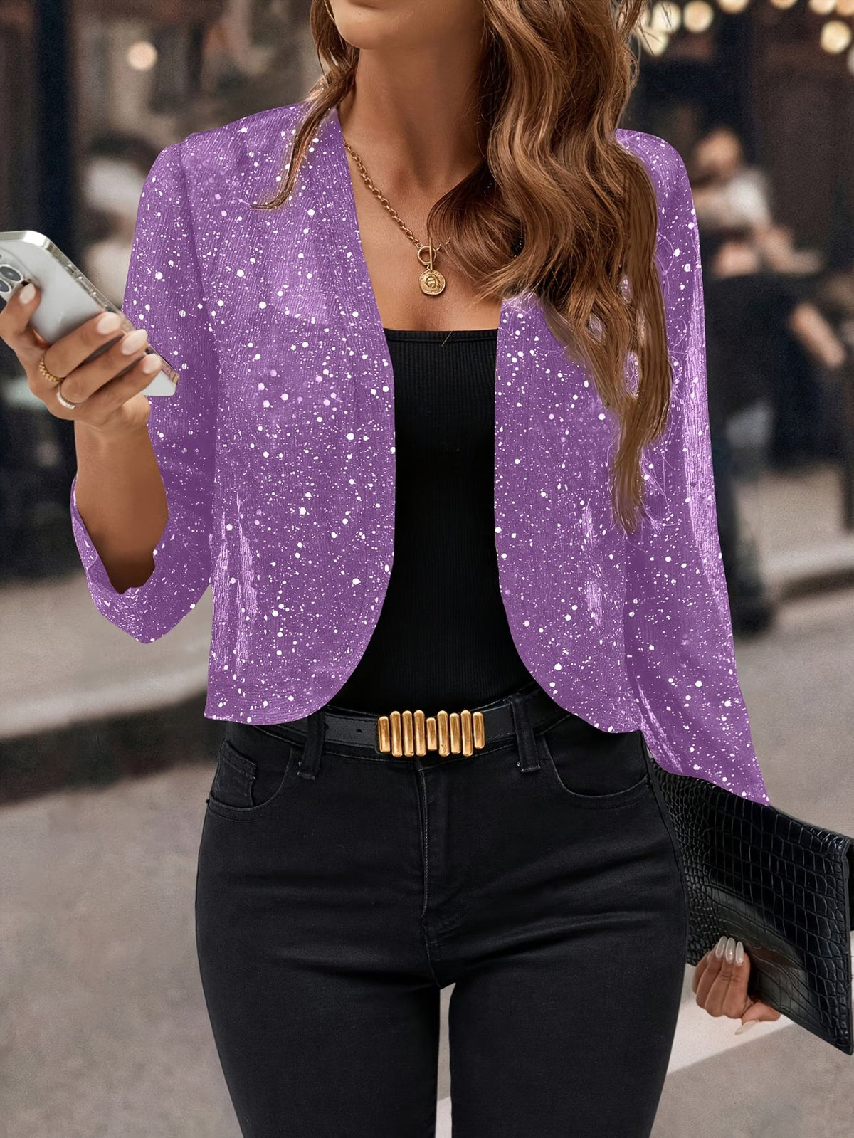 Sheer glitter open front cropped cardigan with long sleeves worn over a black vest and jeans - view 4